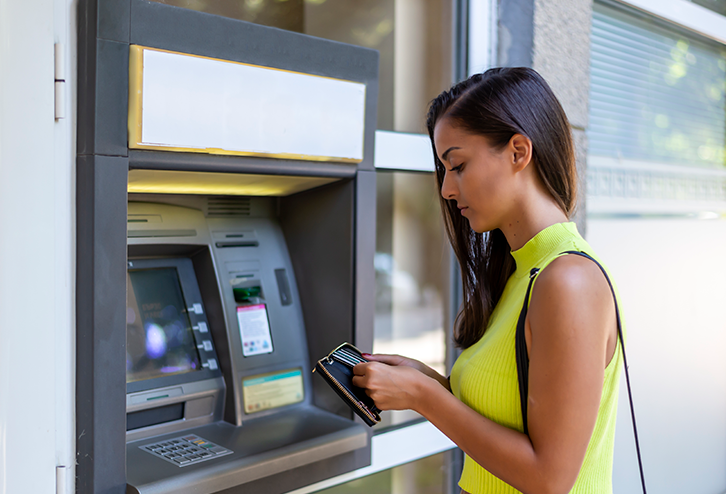 A woman at an ATM